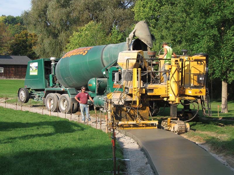Lan-Co Pouring Concrete Sidewalk